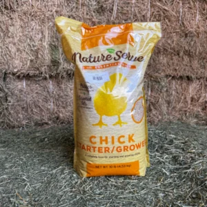 Bag of Nature's Strike Chick Starter/Grower feed for poultry.