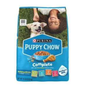 Bag of Purina Puppy Chow Complete dog food with a puppy and child on the packaging.