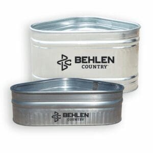 Two metal containers with Behlen Country branding, one larger and one smaller.