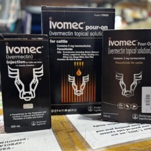 Boxes of Ivomec pour-on livestock topical solution for parasite control.
