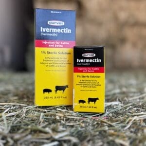 Two boxes of Intercette pest control products on hay.